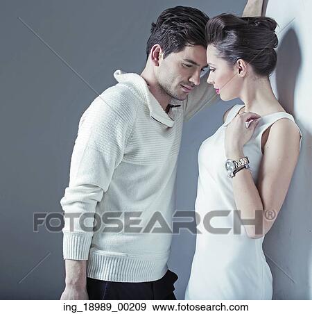 Elegant guy trying to seduce a woman View Large Photo Image Stock Photo - Elegant guy trying to seduce a woman. Fotosearch