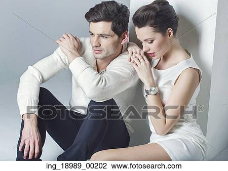 Elegant young couple having a break View Large Photo Image Stock Image - Elegant young couple having a break. Fotosearch
