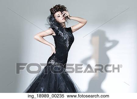 Elegant young lady wearing fancy dress View Large Photo Image Stock Photography - Elegant young lady wearing fancy dress. Fotosearch