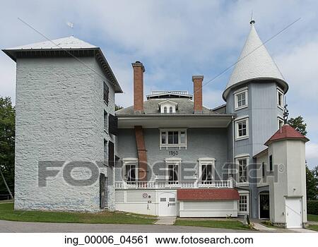 Stock Image - Facade of a building, Manoir-Papineau National Historic Site, Montebello, Quebec, Canada. Fotosearch