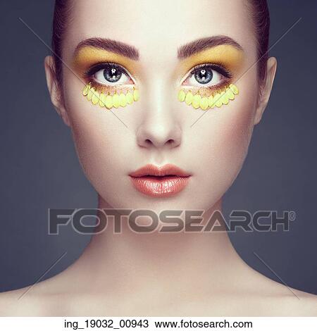 Face of beautiful woman decorated with flowers. Perfect makeup. Beauty fashion. Eyelashes. Cosmetic Eyeshadow View Large Photo Image Stock Image - Face of beautiful woman decorated with flowers. Perfect makeup. Beauty fashion. Eyelashes. Cosmetic Eyeshadow. Fotosearch