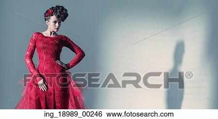 Fantastic lady wearing fashionbable red dress View Large Photo Image Stock Photograph - Fantastic lady wearing fashionbable red dress. Fotosearch
