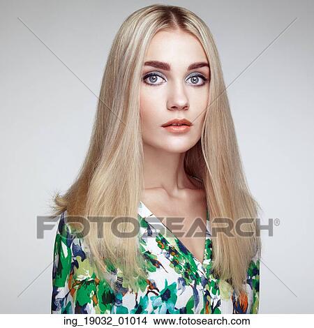 Picture - Fashion portrait of elegant woman with magnificent hair. Blonde girl. Perfect make-up. Hairstyle. Summer dress. Fotosearch