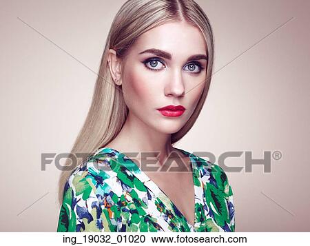 Fashion portrait of elegant woman with magnificent hair. Blonde girl. Perfect make-up. Hairstyle. Summer dress View Large Photo Image Stock Image - Fashion portrait of elegant woman with magnificent hair. Blonde girl. Perfect make-up. Hairstyle. Summer dress. Fotosearch