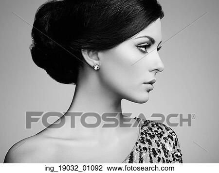 Fashion portrait of elegant woman with magnificent hair. Brunette girl. Perfect make-up. Black and white View Large Photo Image Stock Image - Fashion portrait of elegant woman with magnificent hair. Brunette girl. Perfect make-up. Black and white. Fotosearch