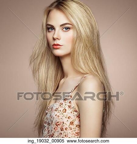 Fashion portrait of elegant woman with magnificent hair. Blonde girl. Perfect make-up. Hairstyle View Large Photo Image Stock Photography - Fashion portrait of elegant woman with magnificent hair. Blonde girl. Perfect make-up. Hairstyle. Fotosearch