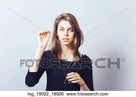 Stock Photograph - female gesture conductor. . Fotosearch