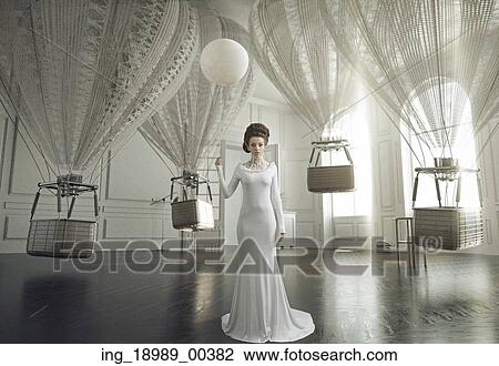 Stock Image - Fine art photo of a young fashion woman in a stylish interior. Fotosearch