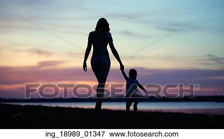 Fine photo the mom walking with baby View Large Photo Image Stock Photo - Fine photo the mom walking with baby. Fotosearch