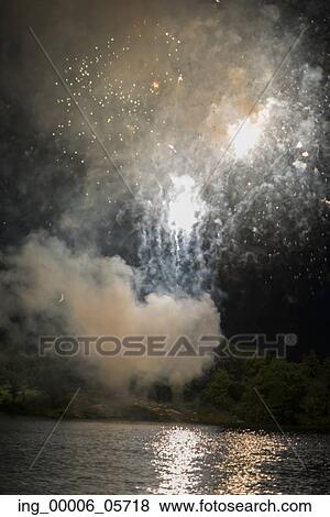 Fireworks display at night on Canada Day, Kenora, Lake Of The Woods, Ontario, Canada View Large Photo Image Stock Photo - Fireworks display at night on Canada Day, Kenora, Lake Of The Woods, Ontario, Canada. Fotosearch