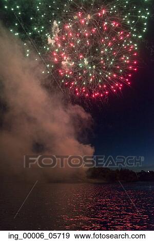 Fireworks display at night on Canada Day, Kenora, Lake Of The Woods, Ontario, Canada View Large Photo Image Stock Photo - Fireworks display at night on Canada Day, Kenora, Lake Of The Woods, Ontario, Canada. Fotosearch