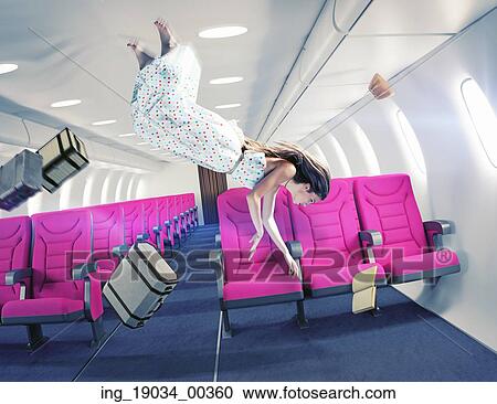 Stock Image - Flying girl in an airplane. Creative concept . Fotosearch
