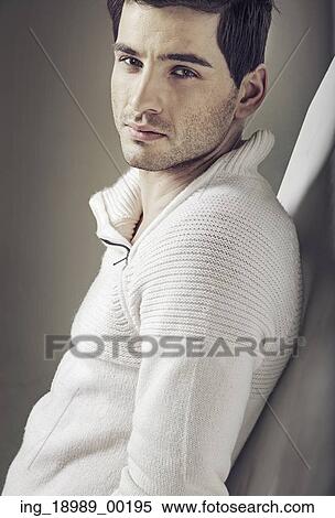 Stock Photography - Handsome young man with amazing brown eyes. Fotosearch