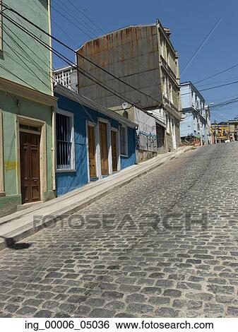 Houses along a cobblestone sloped street, Valparaiso, Chile View Large Photo Image Stock Photograph - Houses along a cobblestone sloped street, Valparaiso, Chile. Fotosearch