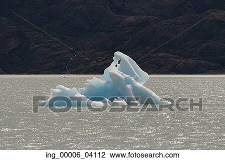 Iceberg in lake, Lake Argentino, Los Glaciares National Park, Santa Cruz Province, Patagonia, Argentina View Large Photo Image Stock Image - Iceberg in lake, Lake Argentino, Los Glaciares National Park, Santa Cruz Province, Patagonia, Argentina. Fotosearch