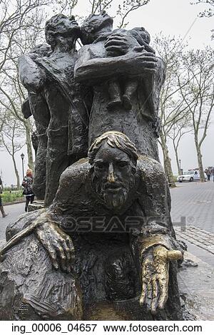 Stock Photo - Immigrants statues, Eisenhower Mall, Battery Park, Manhattan, New York City, New York State, USA. Fotosearch