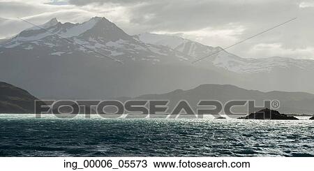 Lake with mountain range in the background, Torres Del Paine National Park, Patagonia, Chile View Large Photo Image Stock Image - Lake with mountain range in the background, Torres Del Paine National Park, Patagonia, Chile. Fotosearch