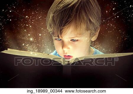 Little boy and the old magic book View Large Photo Image Picture - Little boy and the old magic book. Fotosearch