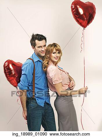 Loving young couple during the valentine’ s day View Large Photo Image Stock Image - Loving young couple during the valentine’ s day. Fotosearch