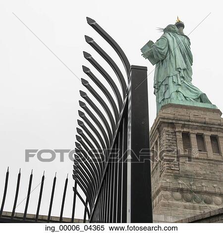 Low angle rear view of the Statue of Liberty, Liberty Island, Manhattan, New York City, New York State, USA View Large Photo Image Stock Photography - Low angle rear view of the Statue of Liberty, Liberty Island, Manhattan, New York City, New York State, USA. Fotosearch
