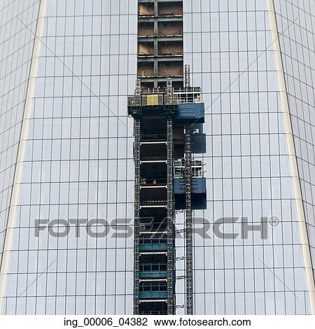 Stock Image - Low angle view of a modern office building, Manhattan, New York City, New York State, USA. Fotosearch