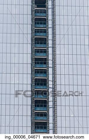 Low angle view of a modern office building, Manhattan, New York City, New York State, USA View Large Photo Image Stock Image - Low angle view of a modern office building, Manhattan, New York City, New York State, USA. Fotosearch