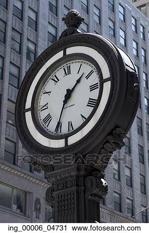 Low angle view of a street clock, Manhattan, New York City, New York State, USA View Large Photo Image Stock Image - Low angle view of a street clock, Manhattan, New York City, New York State, USA. Fotosearch