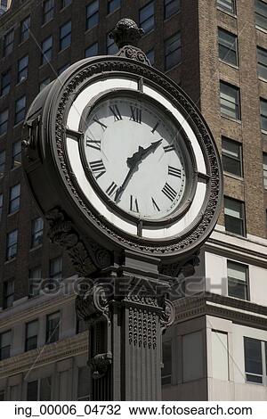 Low angle view of a street clock, Manhattan, New York City, New York State, USA View Large Photo Image Stock Image - Low angle view of a street clock, Manhattan, New York City, New York State, USA. Fotosearch