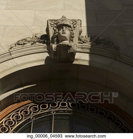 Stock Image - Low angle view of Carving on the exterior wall of the Montreal Museum of Fine Arts, Montreal, Quebec, Canada. Fotosearch
