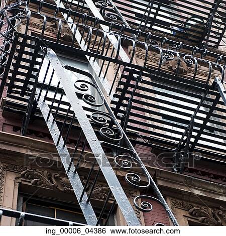 Low angle view of fire escape on a building, SoHo, Manhattan, New York City, New York State, USA View Large Photo Image Stock Photograph - Low angle view of fire escape on a building, SoHo, Manhattan, New York City, New York State, USA. Fotosearch