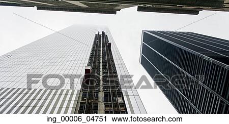 Low angle view of modern skyscrapers, Manhattan, New York City, New York State, USA View Large Photo Image Stock Image - Low angle view of modern skyscrapers, Manhattan, New York City, New York State, USA. Fotosearch