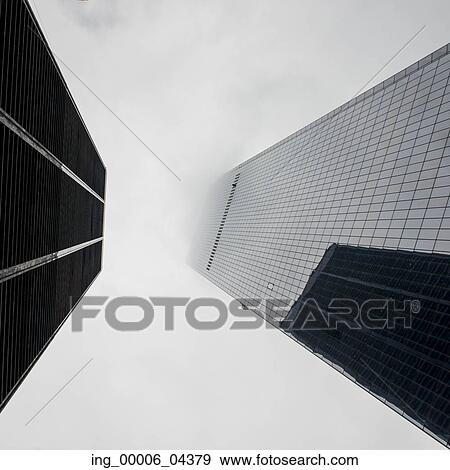 Stock Photo - Low angle view of modern skyscrapers, Manhattan, New York City, New York State, USA. Fotosearch