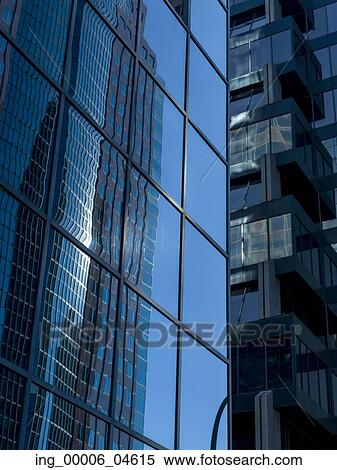 Stock Photography - Low angle view of office buildings, Golden Square Mile, Montreal, Quebec, Canada. Fotosearch