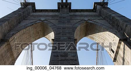 Low angle view of the Brooklyn Bridge, Manhattan, New York City, New York State, USA View Large Photo Image Stock Photo - Low angle view of the Brooklyn Bridge, Manhattan, New York City, New York State, USA. Fotosearch