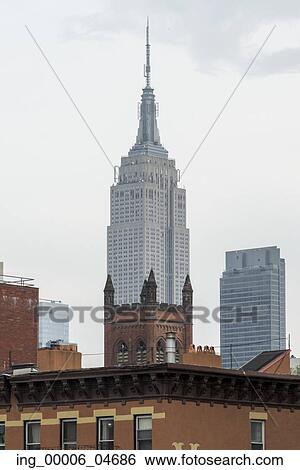 Low angle view of the Empire State Building, Manhattan, New York City, New York State, USA View Large Photo Image Stock Photograph - Low angle view of the Empire State Building, Manhattan, New York City, New York State, USA. Fotosearch