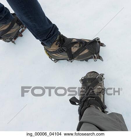 Low section view of hikers with shoe and crampon in snow, Perito Moreno Glacier, Los Glaciares National Park, Santa Cruz Province, Patagonia, Argentina View Large Photo Image Picture - Low section view of hikers with shoe and crampon in snow, Perito Moreno Glacier, Los Glaciares National Park, Santa Cruz Province, Patagonia, Argentina. Fotosearch