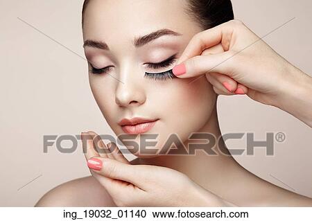 Makeup artist glues eyelashes. Beautiful woman face. Perfect makeup. Beauty fashion. Eyelashes. Cosmetic Eyeshadow View Large Photo Image Stock Image - Makeup artist glues eyelashes. Beautiful woman face. Perfect makeup. Beauty fashion. Eyelashes. Cosmetic Eyeshadow. Fotosearch