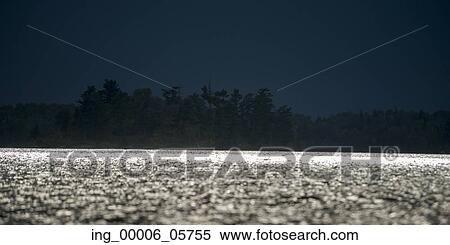 Moonlight reflecting off the lake, Lake Of The Woods, Ontario, Canada View Large Photo Image Stock Photography - Moonlight reflecting off the lake, Lake Of The Woods, Ontario, Canada. Fotosearch