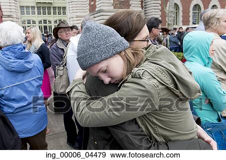 Stock Photo - Mother and daughter hugging, Ellis Island, Jersey City, New York State, USA. Fotosearch