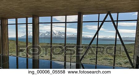 Mountain range viewed through a window of the Tierra Patagonia Hotel, Torres Del Paine National Park, Patagonia, Chile View Large Photo Image Stock Photo - Mountain range viewed through a window of the Tierra Patagonia Hotel, Torres Del Paine National Park, Patagonia, Chile. Fotosearch