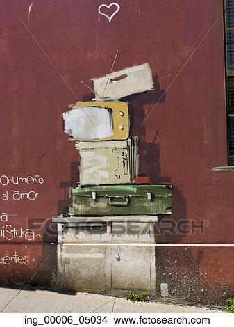 Picture - Mural of Stack of items in front on exterior wall, Valparaiso, Chile. Fotosearch
