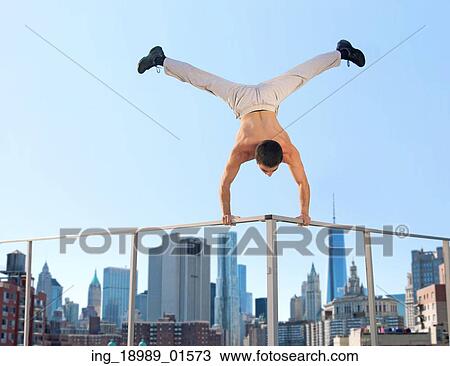 Musucular guy doing the splits View Large Photo Image Stock Image - Musucular guy doing the splits. Fotosearch