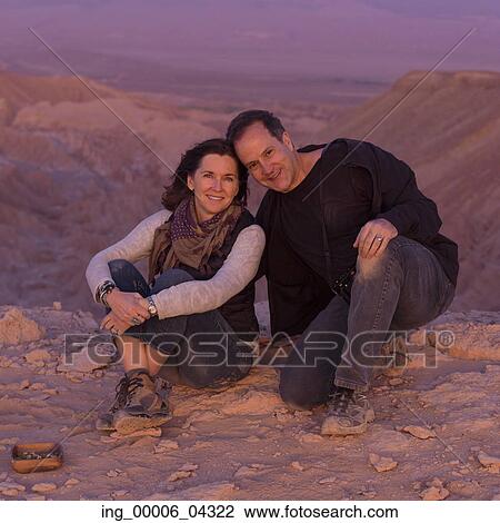 Portrait of a couple in desert, San Pedro de Atacama, El Loa Province, Antofagasta Region, Chile View Large Photo Image Stock Image - Portrait of a couple in desert, San Pedro de Atacama, El Loa Province, Antofagasta Region, Chile. Fotosearch