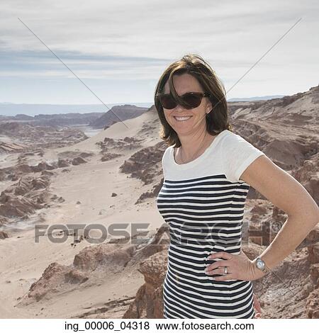 Portrait of a woman in desert, San Pedro de Atacama, El Loa Province, Antofagasta Region, Chile View Large Photo Image Stock Photo - Portrait of a woman in desert, San Pedro de Atacama, El Loa Province, Antofagasta Region, Chile. Fotosearch
