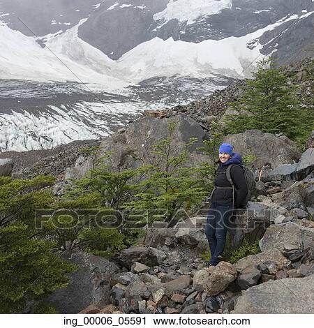 Portrait of a woman posing near French Glacier, French Valley, Torres Del Paine National Park, Patagonia, Chile View Large Photo Image Stock Image - Portrait of a woman posing near French Glacier, French Valley, Torres Del Paine National Park, Patagonia, Chile. Fotosearch