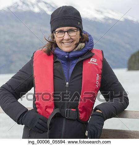 Portrait of a woman smiling, Patagonia, Chile View Large Photo Image Picture - Portrait of a woman smiling, Patagonia, Chile. Fotosearch