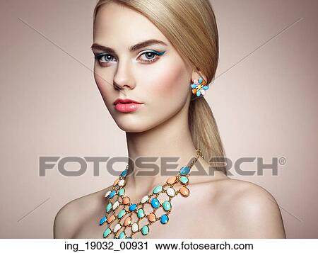 Portrait of beautiful sensual woman with elegant hairstyle. Perfect makeup. Blonde girl. Fashion photo. Jewelry View Large Photo Image Stock Image - Portrait of beautiful sensual woman with elegant hairstyle. Perfect makeup. Blonde girl. Fashion photo. Jewelry. Fotosearch