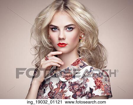Portrait of beautiful sensual woman with elegant hairstyle. Perfect makeup. Blonde girl. Fashion photo. Jewelry and dress View Large Photo Image Stock Image - Portrait of beautiful sensual woman with elegant hairstyle. Perfect makeup. Blonde girl. Fashion photo. Jewelry and dress. Fotosearch