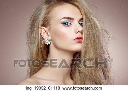 Portrait of beautiful sensual woman with elegant hairstyle. Perfect makeup. Blonde girl. Fashion photo. Jewelry View Large Photo Image Stock Photo - Portrait of beautiful sensual woman with elegant hairstyle. Perfect makeup. Blonde girl. Fashion photo. Jewelry. Fotosearch