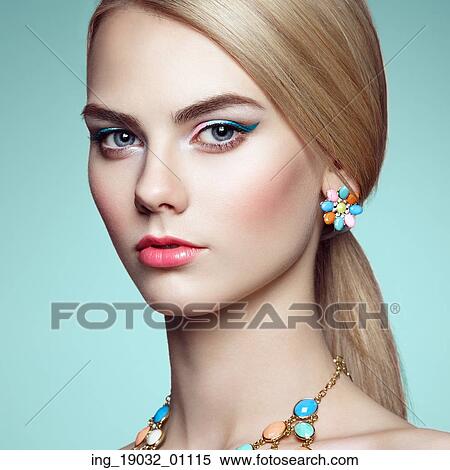 Portrait of beautiful sensual woman with elegant hairstyle. Perfect makeup. Blonde girl. Fashion photo. Jewelry View Large Photo Image Stock Photography - Portrait of beautiful sensual woman with elegant hairstyle. Perfect makeup. Blonde girl. Fashion photo. Jewelry. Fotosearch